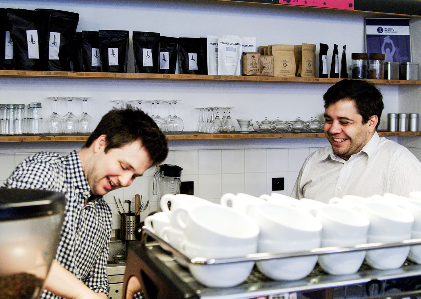 EMA's head barista Adam Neubauer, on the left, prepares an espresso as owner Kamil Skrbek. (Photos: Jaroslav Slamecka.)