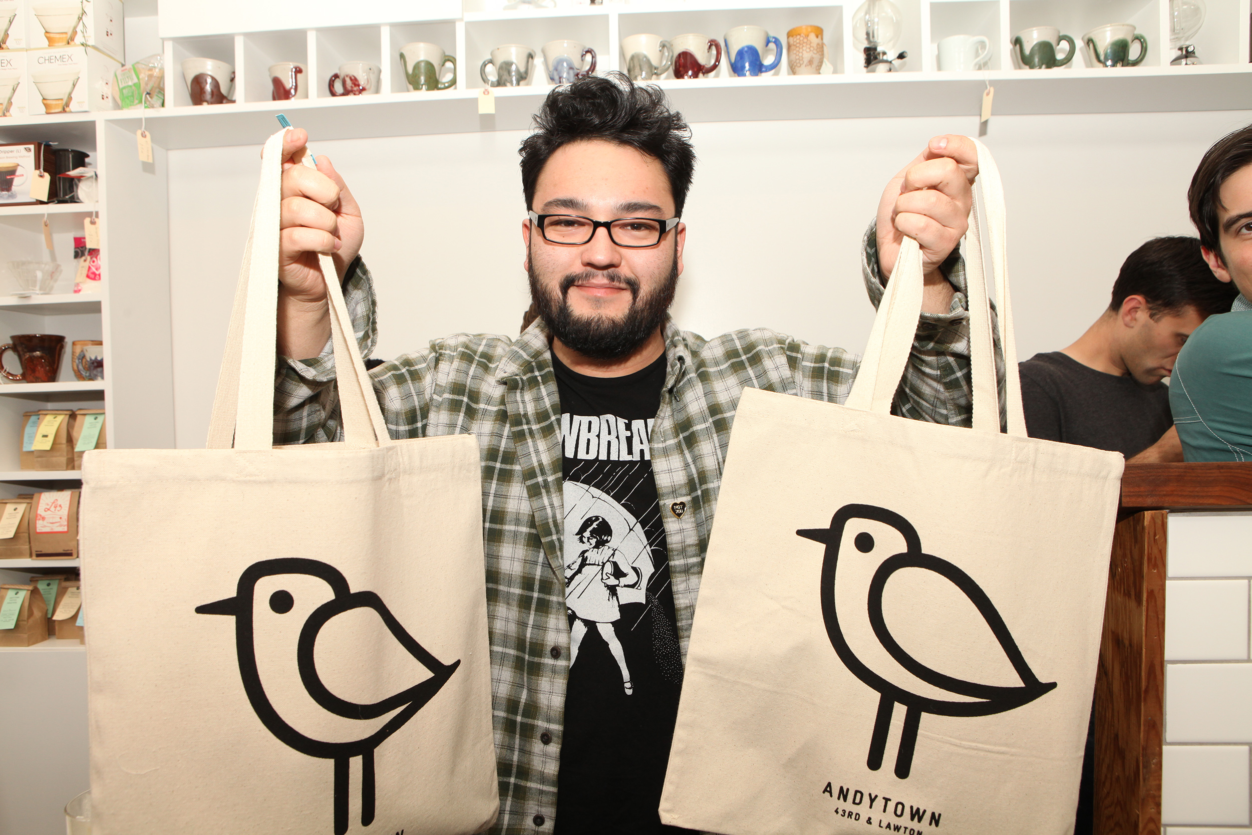 Some of Andytown's bird merch. (Photo courtesy Andytown Coffee Roasters.)