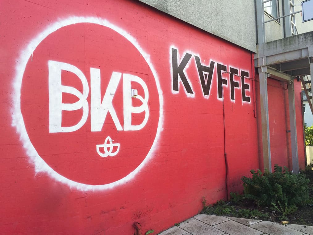 A brightly painted wall outside Bergen Kaffeebrenneri; bergen coffee