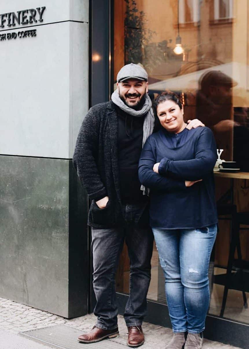Bora and Tansel Özbek stand in front of the Refinery café. 